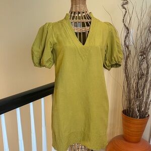 Emily McCarthy green dress